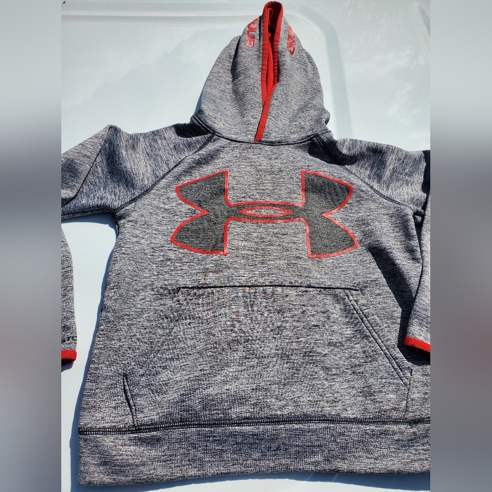 Under armour gray and red sweatshirt size small youth fits around size 7…